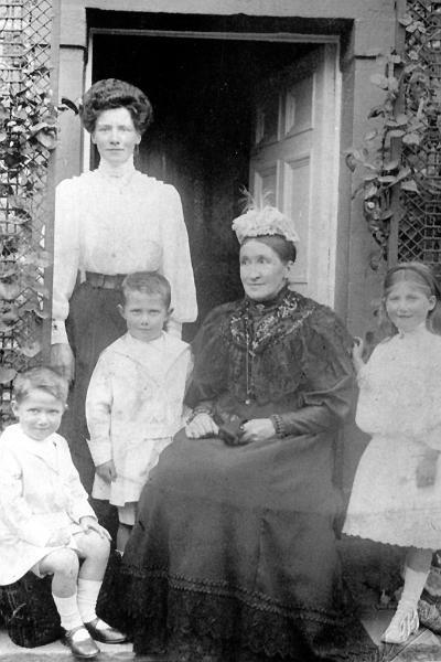 Armistead Family -  Poplar House.jpg - Hannah Dinsdale nee Morre, 1838 - 1918 with her daughter and grand children, outside Poplar House. Left to right:  Henry Elsworth Armistead, Jane Elizabeth Armistread ( standing ),                    John Ockshott Armistead, Hannah Dinsdale nee Moore,  Hannah Margaret Armistead.